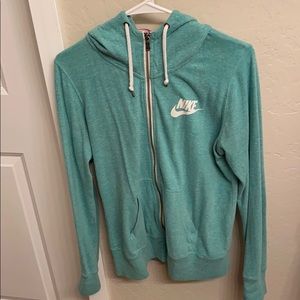 Nike zip up size large in teal blue